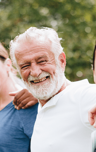 Man smiling with family