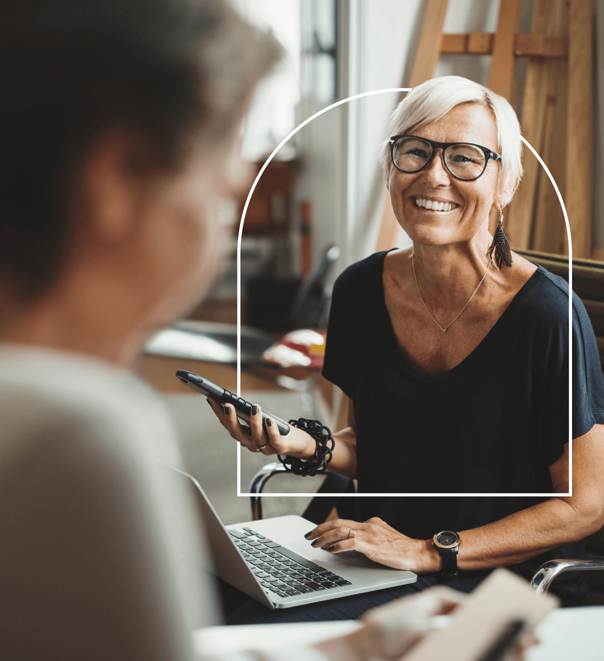 Female advisor discussing financial plans with a couple